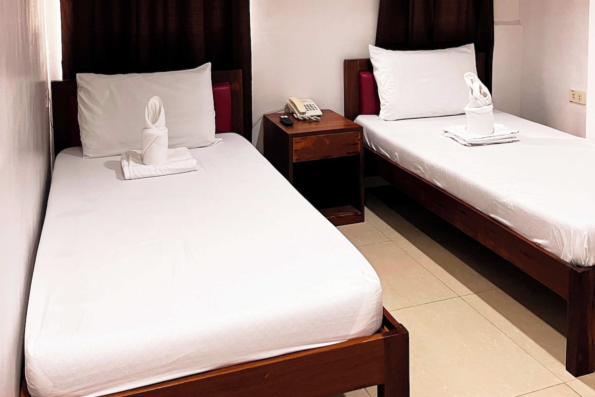 Deluxe-Zweibettzimmer | Verdunkelungsvorhänge, schallisolierte Zimmer, Zustellbetten