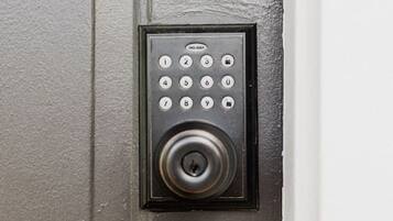 A door with a keypad lock.