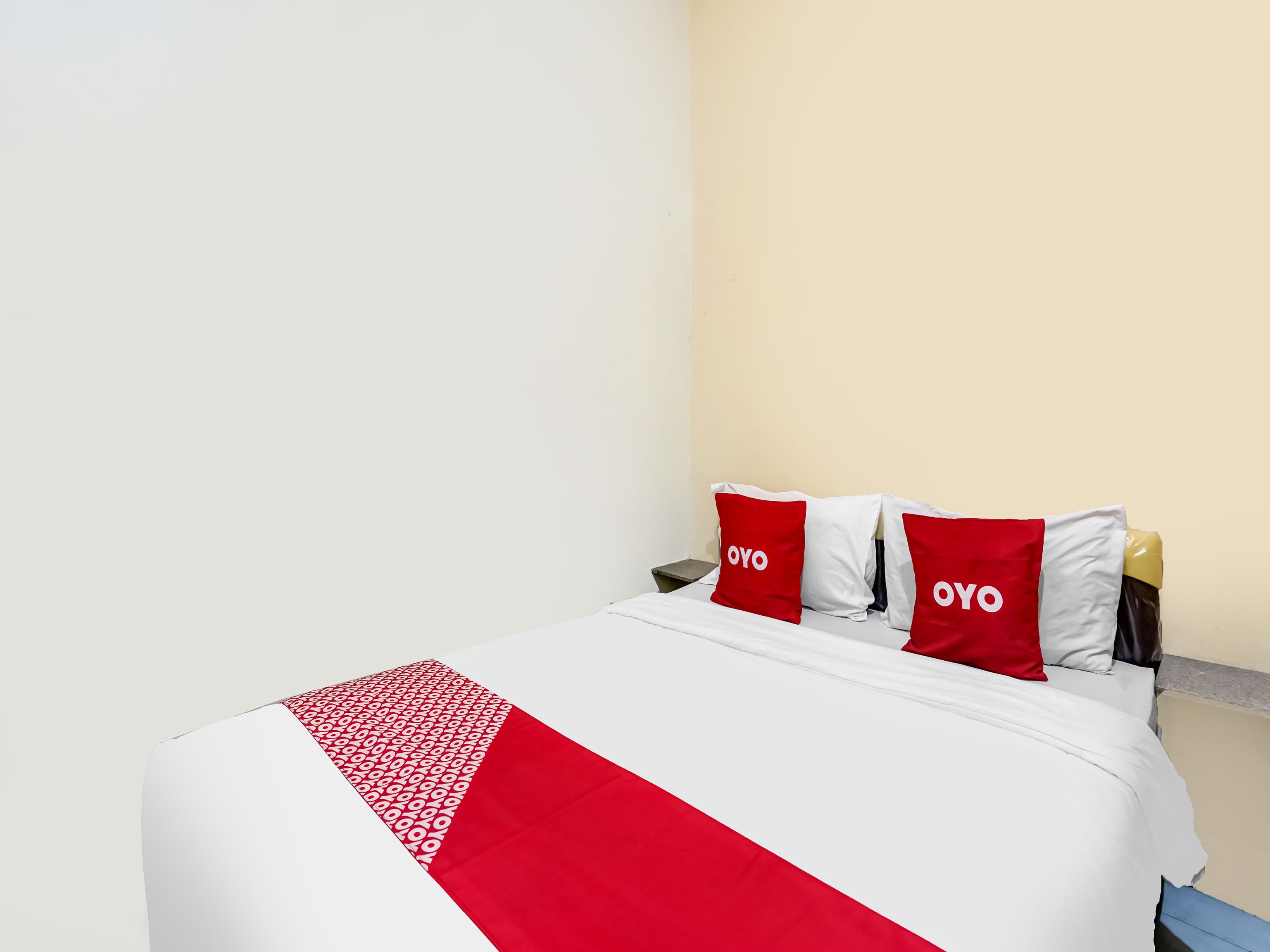Desk, laptop workspace, bed sheets
