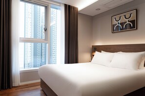 Family Room, 2 Bedrooms | Blackout curtains, free WiFi, bed sheets - Le collective Gangnam SAC Signity (Seoul)