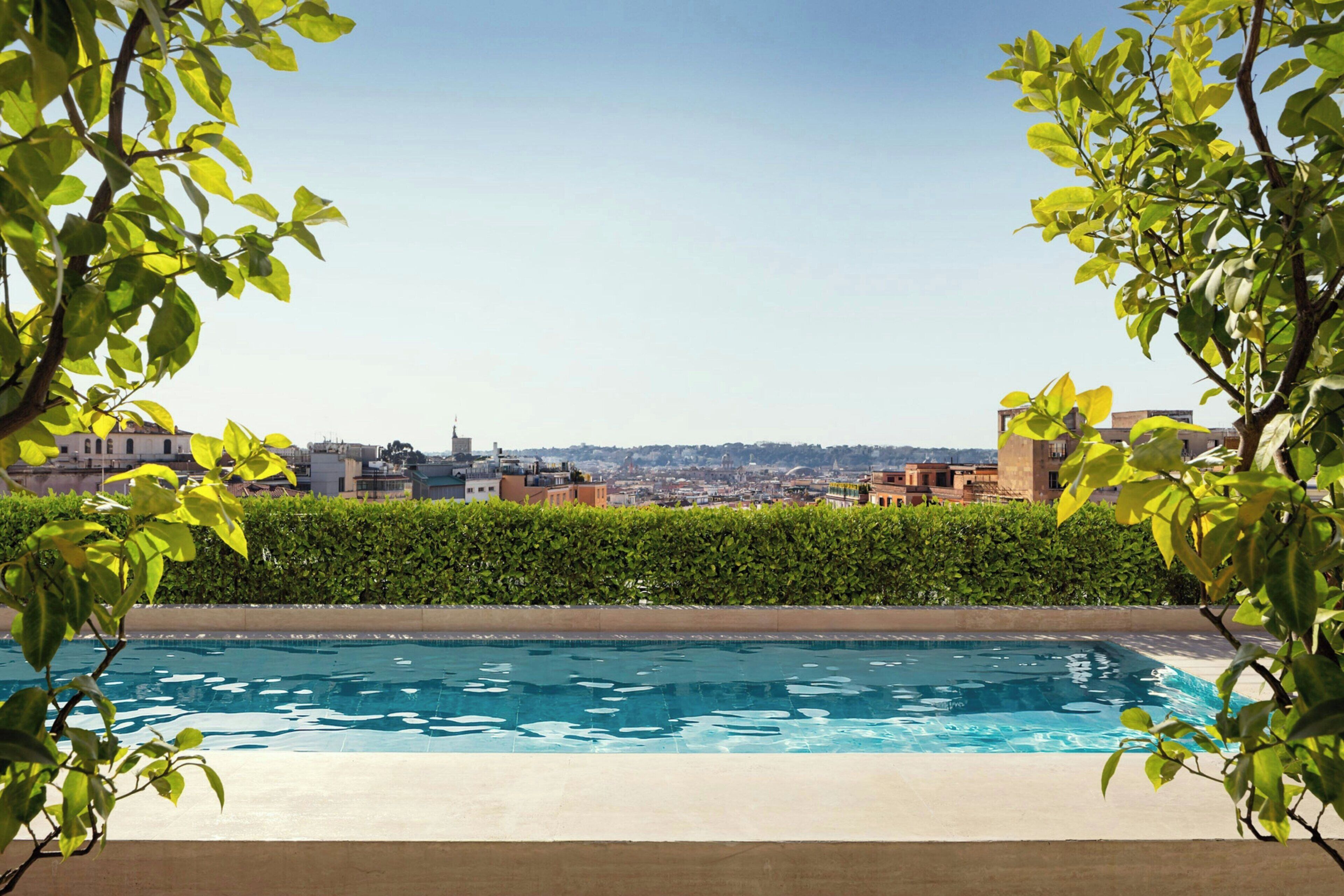 Outdoor pool, pool umbrellas, sun loungers