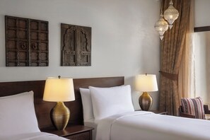 Premium bedding, minibar, in-room safe, individually decorated - Aldhafra Resort, Vignette Collection by IHG (Madinat Zayed)