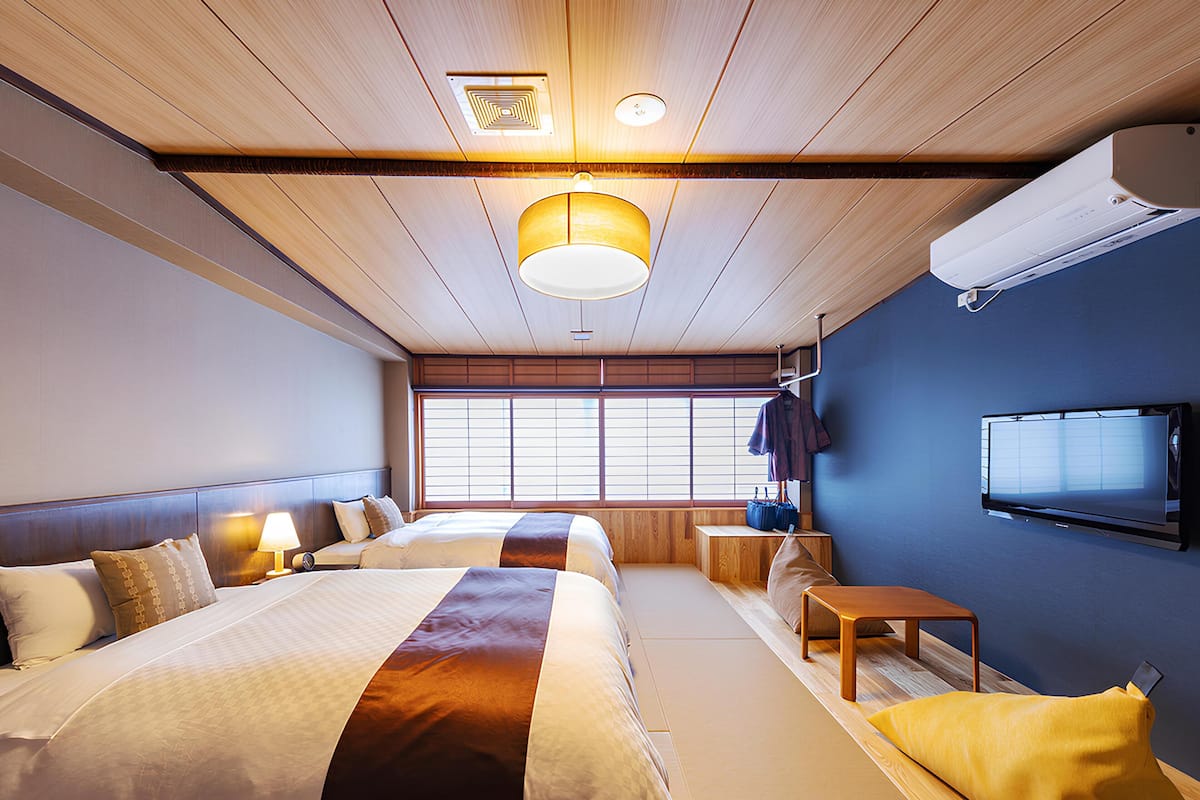 Standard Quadruple Room, Non Smoking | In-room safe, blackout curtains, iron/ironing board, free WiFi