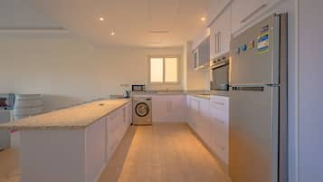 Luxury Apartment | Private kitchen | Microwave, oven, cookware/dishes/utensils