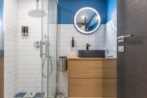 Shower, eco-friendly toiletries, hair dryer, towels