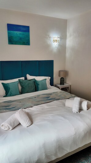 1 bedroom, desk, iron/ironing board, travel crib