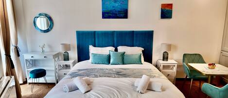 1 bedroom, desk, iron/ironing board, travel crib