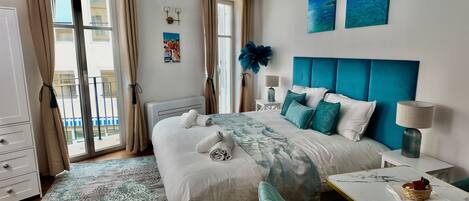 1 bedroom, desk, iron/ironing board, travel crib