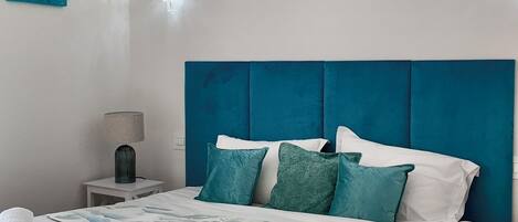 1 bedroom, desk, iron/ironing board, travel crib