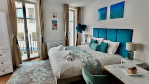 1 bedroom, desk, iron/ironing board, travel crib