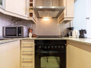 Fridge, microwave, oven, cookware/dishes/utensils