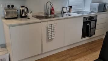 Fridge, oven, electric kettle, toaster