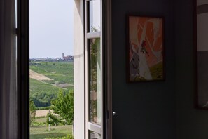 Quarto júnior, 1 cama King | Vista do quarto