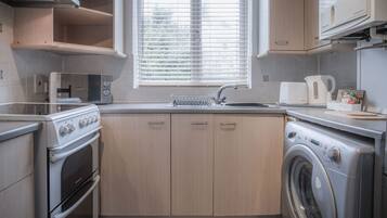 Standard Apartment | Private kitchen | Dining tables