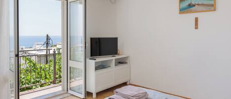 1 bedroom, desk, iron/ironing board, travel cot