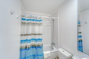 Bathtub, hair dryer, towels