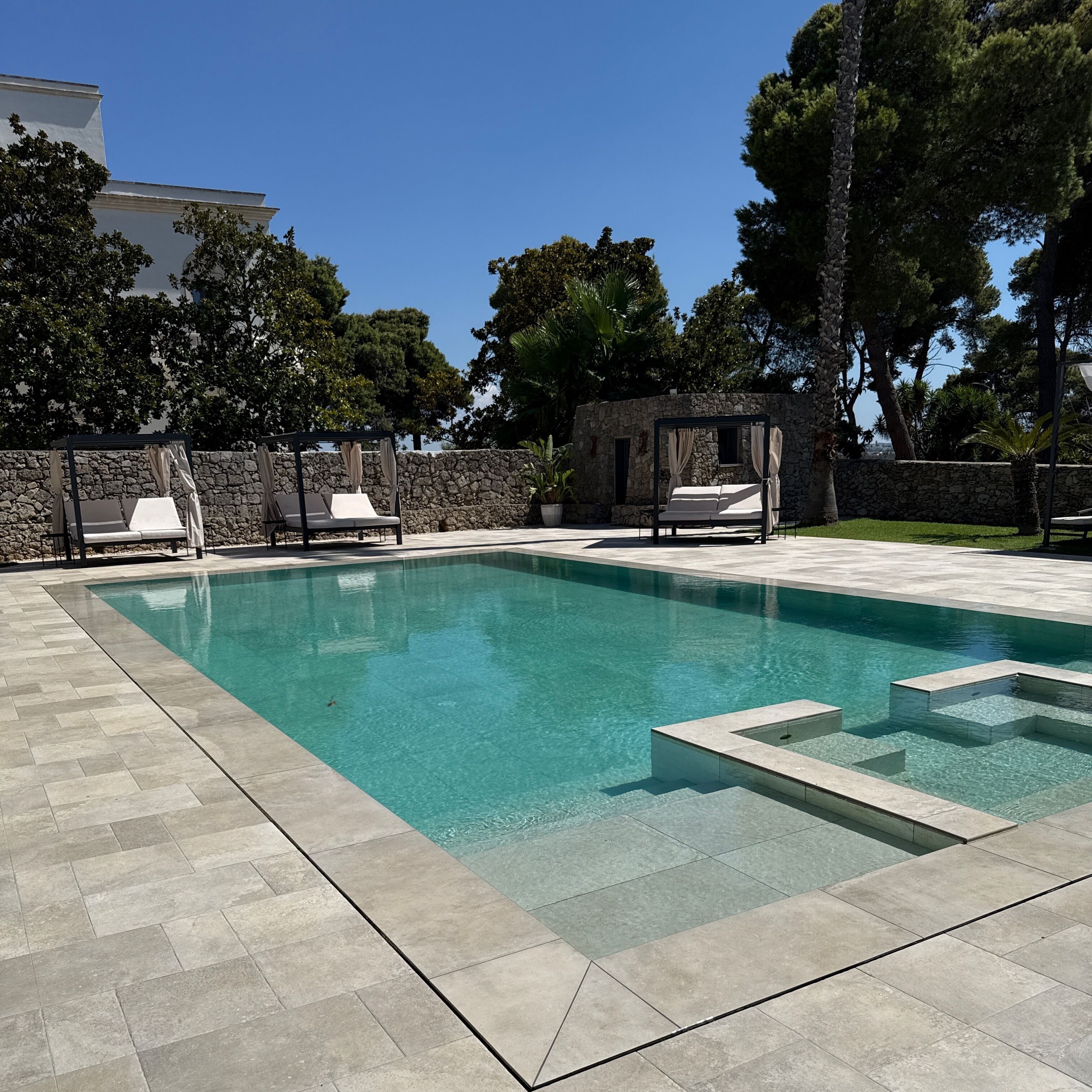 Outdoor pool, pool umbrellas, sun loungers