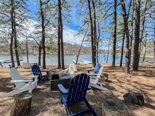 Iconic Cabin! Hot tub, fire pit, lakefront, dock, pet friendly and more!