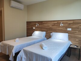 Egyptian cotton sheets, premium bedding, desk, laptop workspace