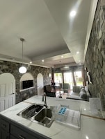 Gallery Suite, 2 Bedrooms (Deluxe 2BDR Family Suite) | Living area | 55-inch Smart TV with digital channels, TV, Netflix