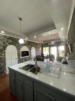 Gallery Suite, 2 Bedrooms (Deluxe 2BDR Family Suite) | Private kitchen | Fridge, microwave, coffee/tea maker, electric kettle - Stonetrail (Villa)