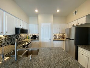 Fridge, microwave, oven, stovetop - Blue Heron Bay - Pool, Boat Slip, Bayfront South Padre Island Vacation Home (South Padre Island)