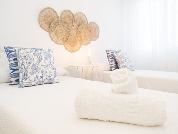 2 dormitorios, tabla de planchar con plancha, Internet y ropa de cama