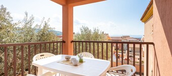 Apartment 'La Basoledda' with Sea View, Private Terrace and Air Conditioning