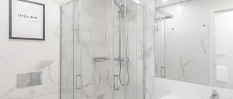 Shower, hair dryer, towels, soap