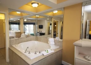 Shower, jetted tub, hair dryer, towels