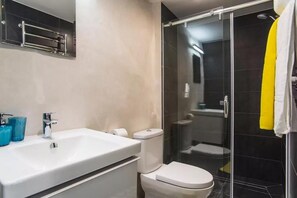 Shower, towels, toilet paper
