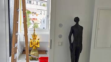 Luxury Condo | Living area | 50-inch Smart TV with cable channels, TV, Netflix