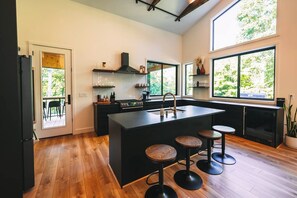 Fridge, microwave, oven, stovetop - A modern cabin on 78 private acres of woodlands (Logan)