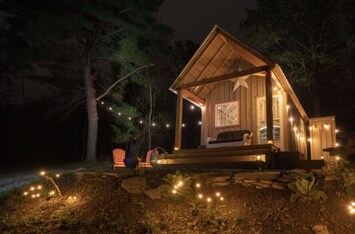 Private Cabin nestled in the woods.  Lake view in the distance.