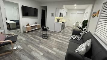 Family Apartment | Living area | 40-inch Smart TV with digital channels, Netflix, streaming services