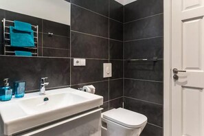 Shower, free toiletries, hair dryer, towels