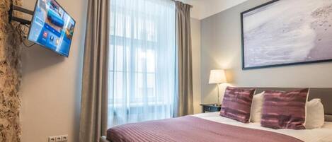 1 slaapkamer, een strijkplank/strijkijzer, reisbedje, gratis wifi