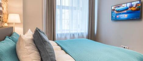 1 slaapkamer, een strijkplank/strijkijzer, reisbedje, wifi