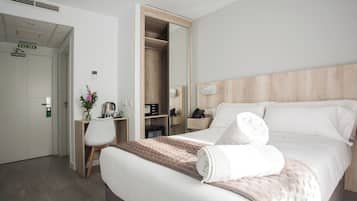 Premium bedding, in-room safe, individually decorated