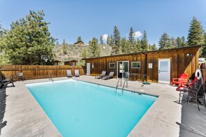 Seasonal outdoor pool, open 10:00 AM to 7:00 PM, pool loungers