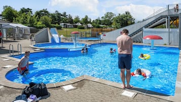 Seasonal outdoor pool, pool loungers