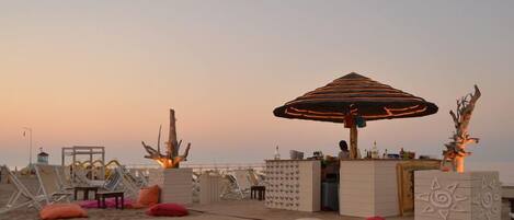 On the beach, beach yoga, beach volleyball, 4 beach bars