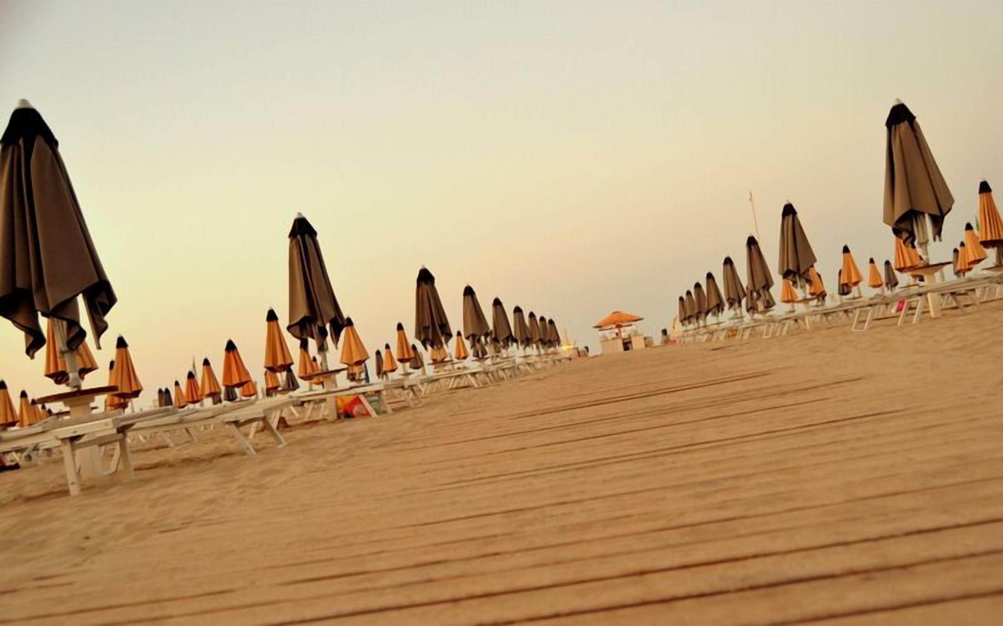 On the beach, beach yoga, beach volleyball, 4 beach bars