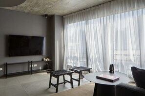 Premier Duplex, 1 Bedroom, Terrace | Living room | 65-inch Smart TV with cable channels, TV - Nido Pasaje Cabrer (Buenos Aires)