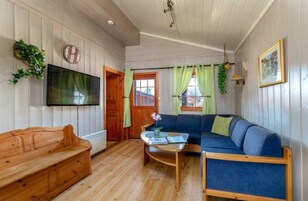 Cabana luxo | Área de estar | TV de tela plana 32 polegadas com canais a cabo, TV