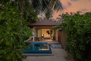 A private villa with a swimming pool, a bedroom, and a sitting area. - Avani+ Fares Maldives Resort (Fares)