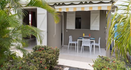 Detached gite situated opposite the swimming pool in a beautiful garden.