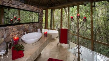 Honeymoon Room | Bathroom | Hair dryer, bathrobes