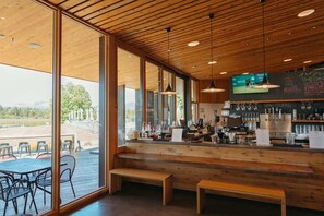 Enjoy a meal or snack in this cozy space with a view of the outdoors.