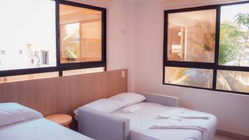 Roupas de cama premium, frigobar, individualmente decorados